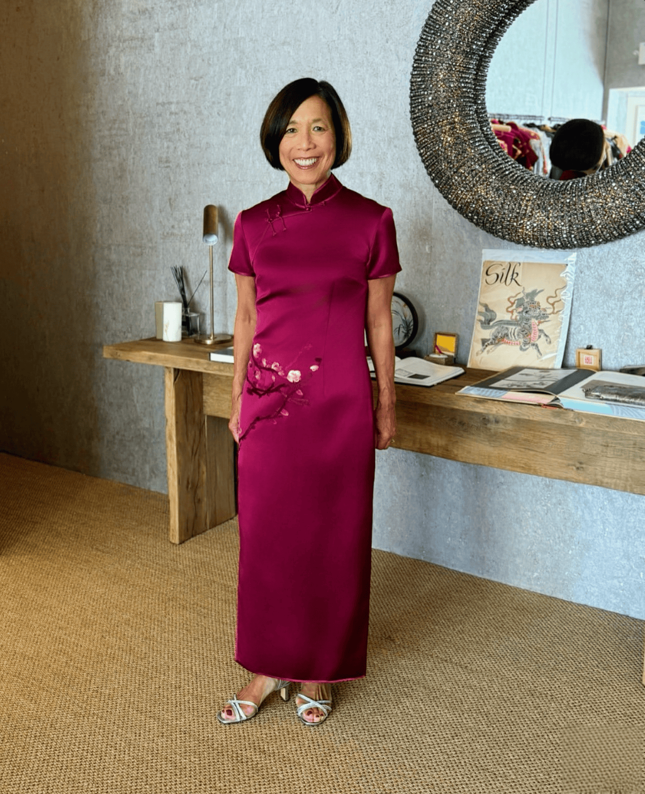 Real client Kris wearing bespoke maroon red Qipao with delicate cherry blossom hand embroidery, custom made to measure at JINZA Los Angeles