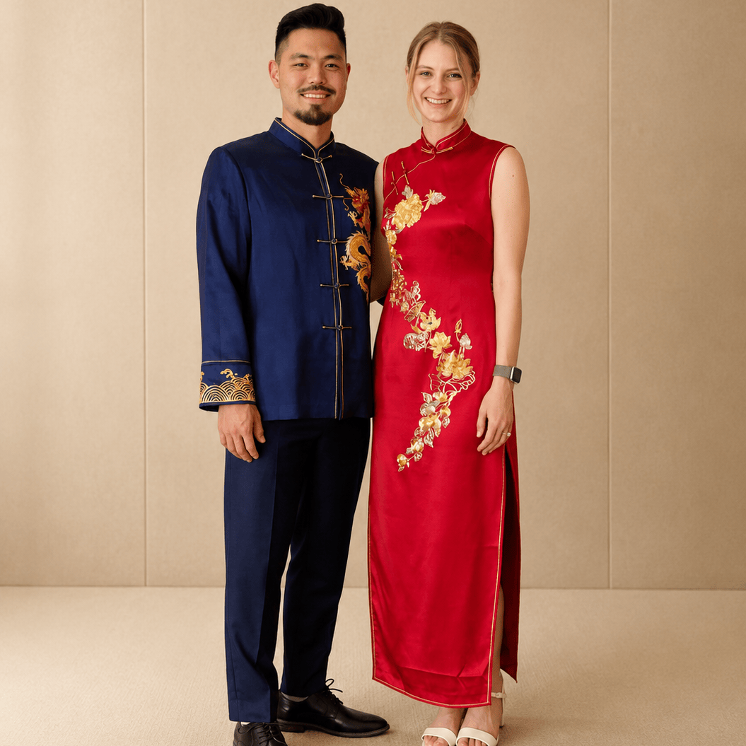 Couple in matching bespoke navy Zhongshan suit with gold dragon embroidery and red silk sleeveless Qipao with gold floral embroidery — Chinese wedding dress guide by JINZA Oriental Couture, Los Angeles