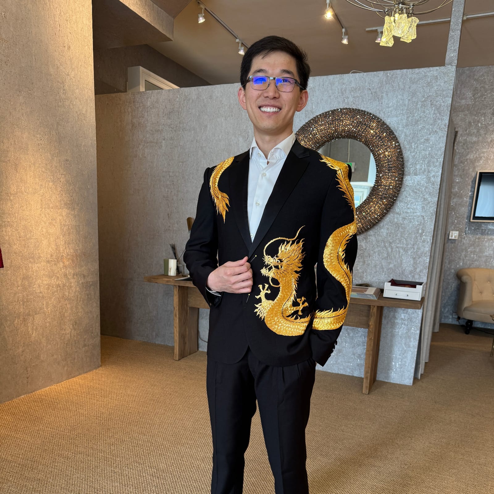 Bespoke blue Zhongshan suit worn by
groom at Chinese wedding tea ceremony,
custom made to measure at JINZA
Los Angeles