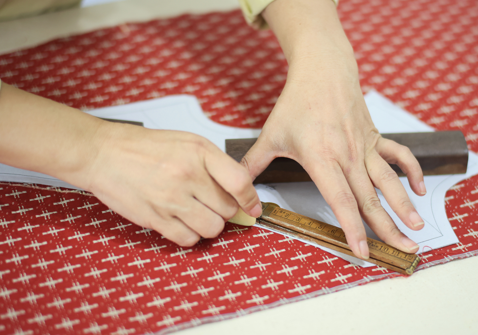 Paper pattern drafting for custom Qipao with client body measurements at JINZA