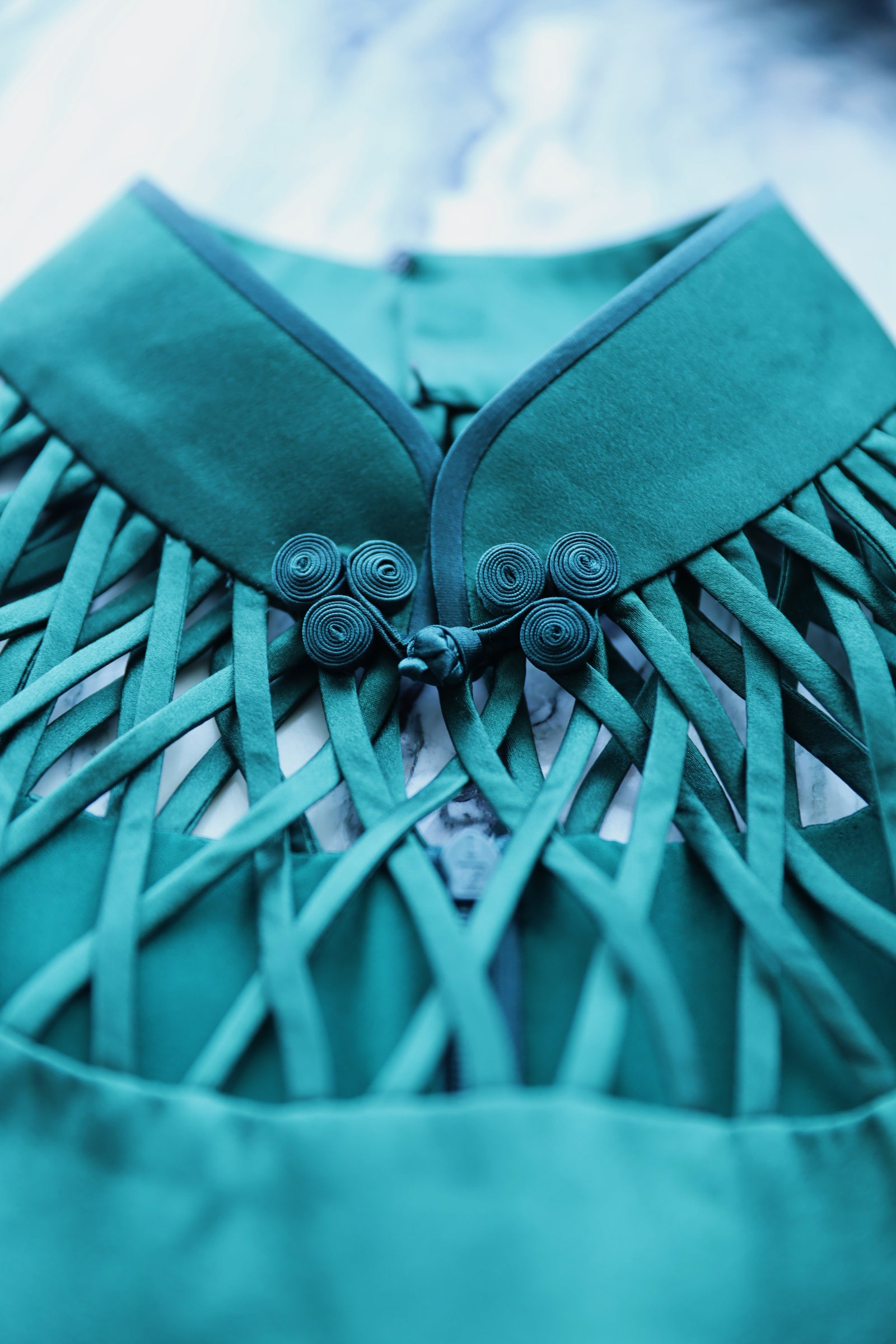Emerald Green Silk Qipao with Hand-Finished Lattice Details