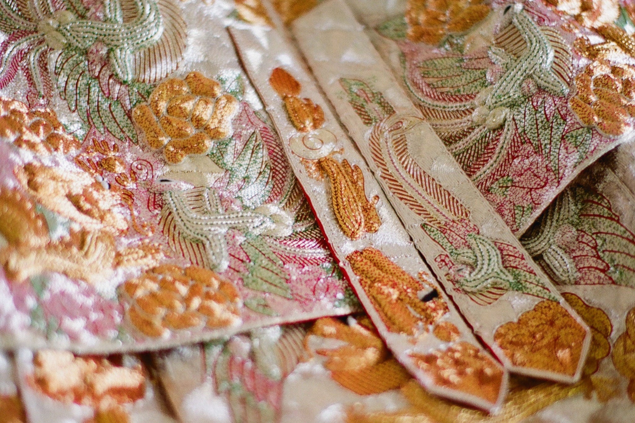 Generation belt embroidery details on King Kwa