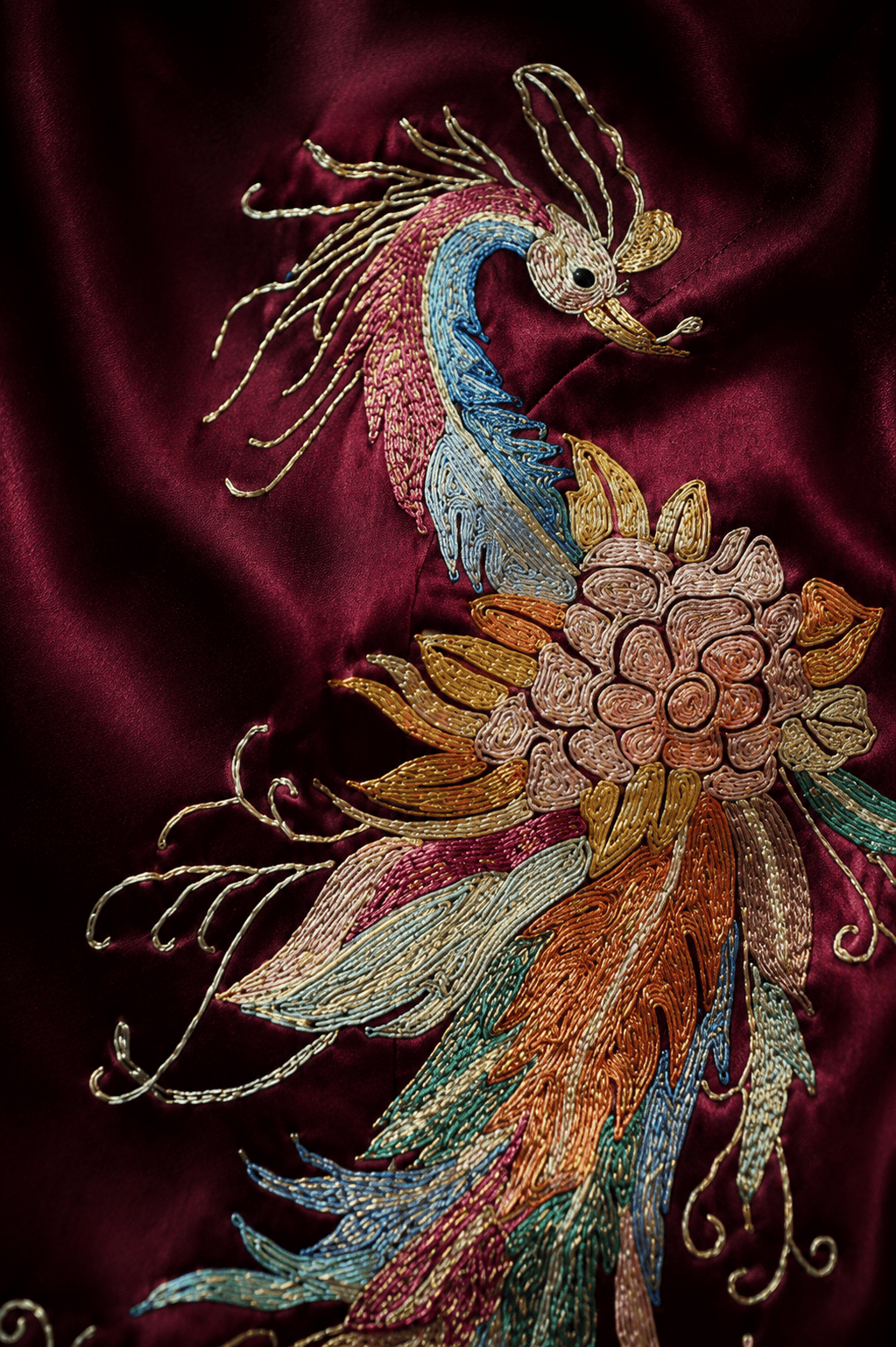 Colorful phoenix hand embroidery in metallic thread on wine red silk Qipao