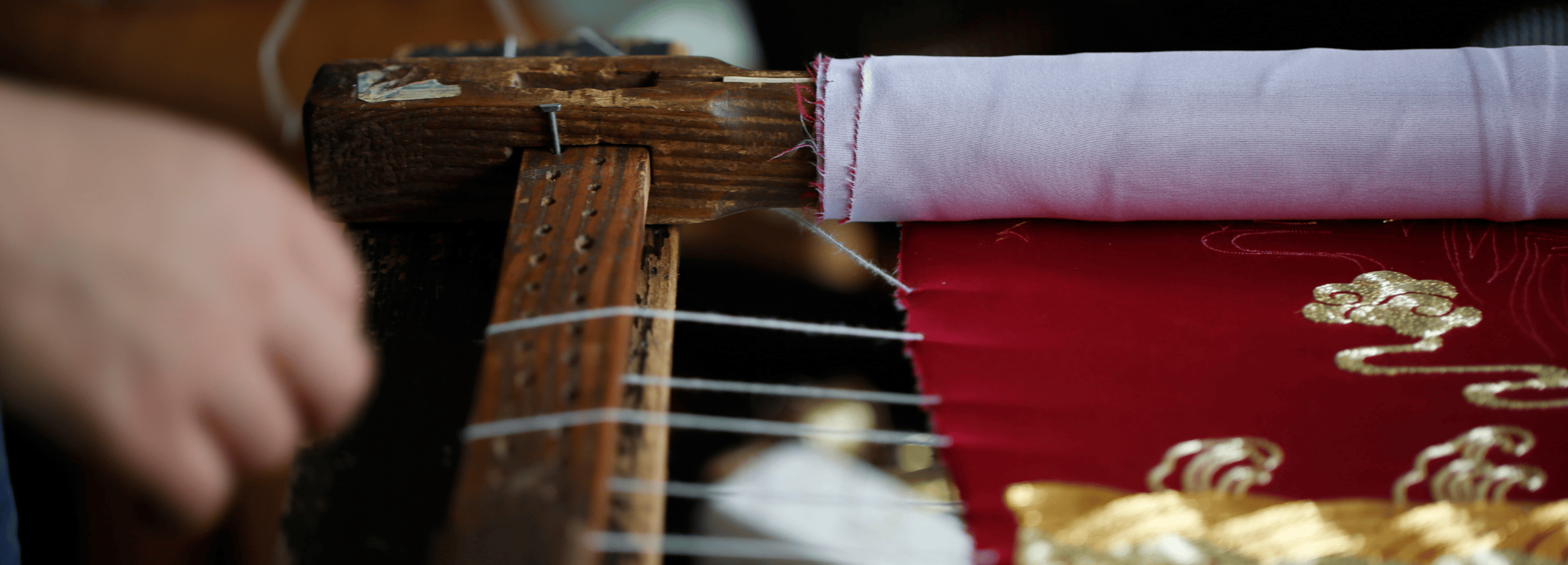 Hand drawing a custom Qipao embroidery design at JINZA