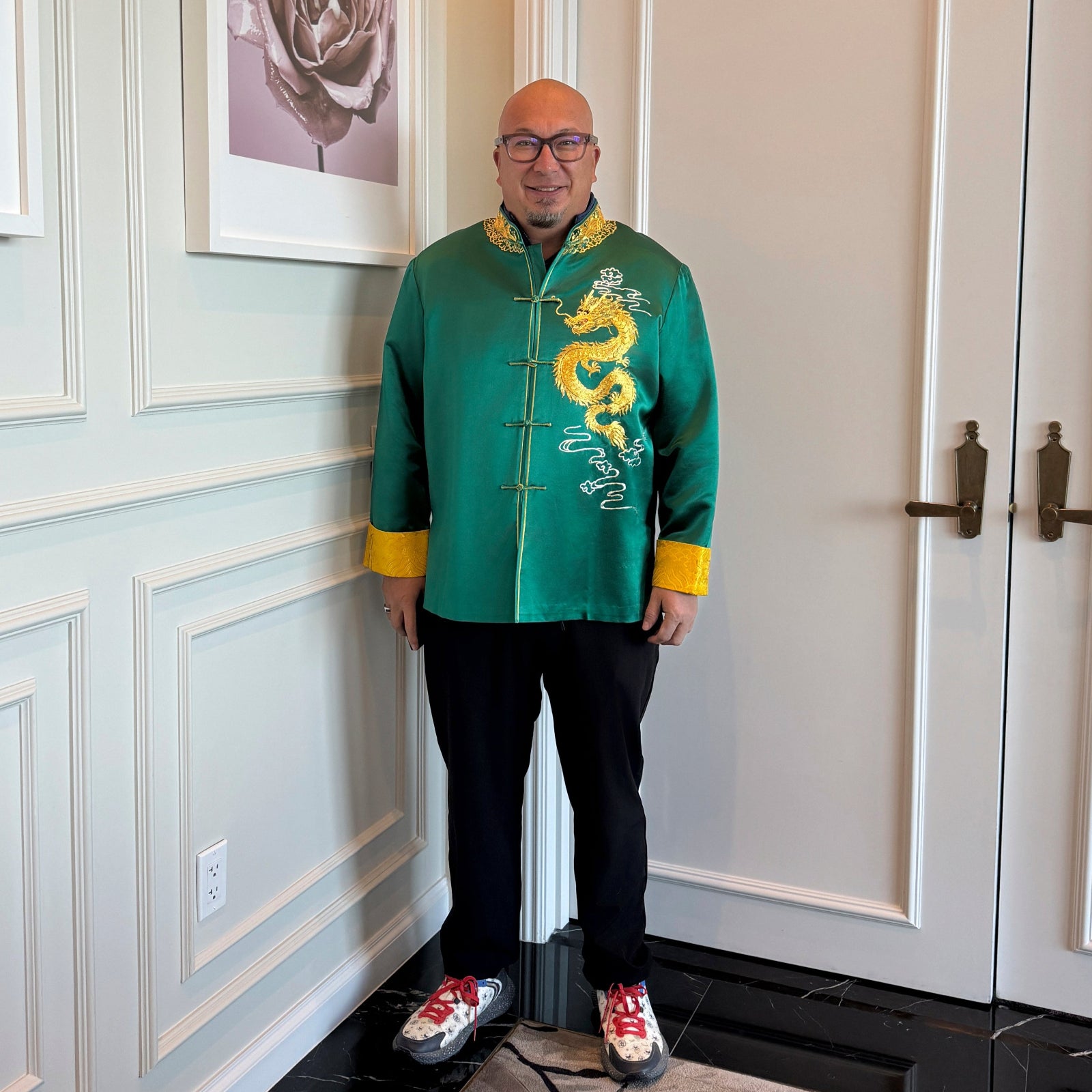 Raymond W. in custom green silk Tang suit with flying dragon embroidery and gold lining