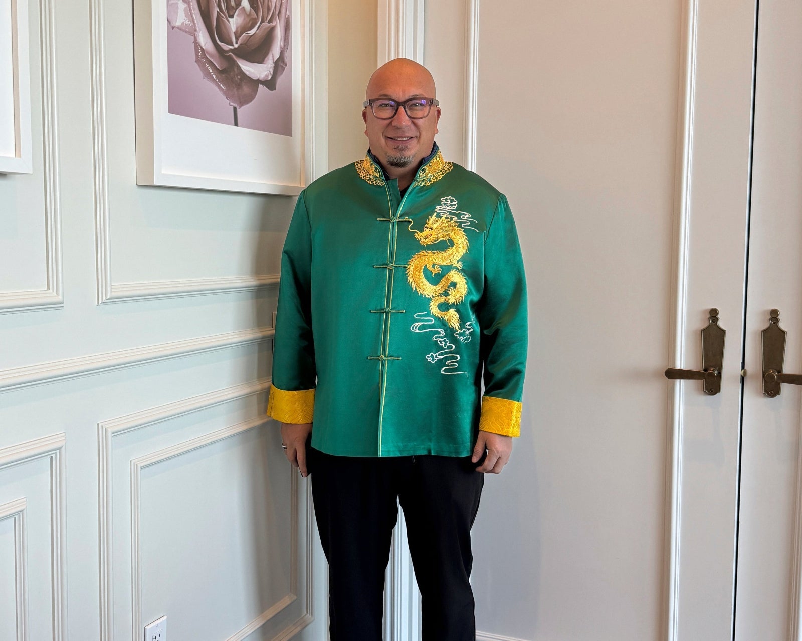 Raymond W. in custom green silk Tang suit with flying dragon embroidery and gold lining