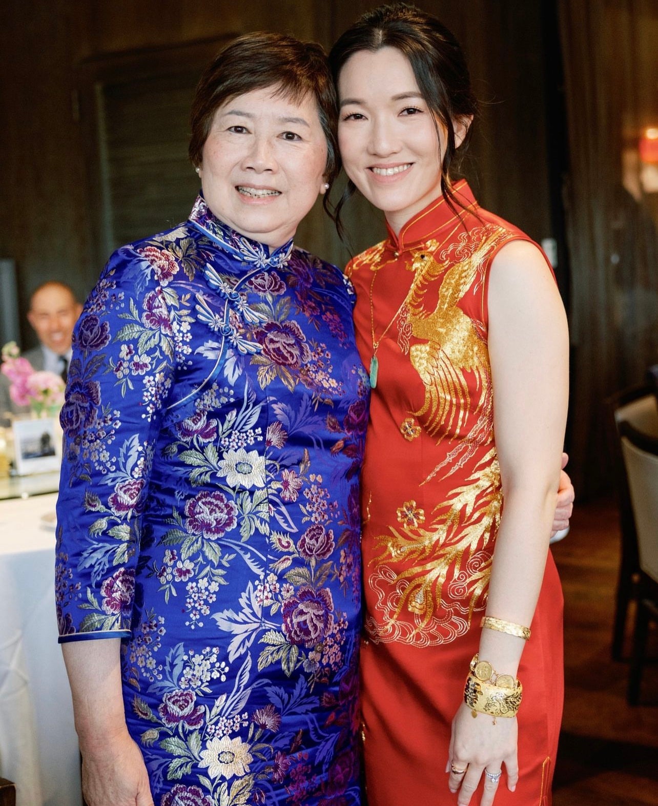 Real bride wearing red Goldwork II Qipao with gold dragon and phoenix hand embroidery by JINZA Oriental Couture for tea ceremony