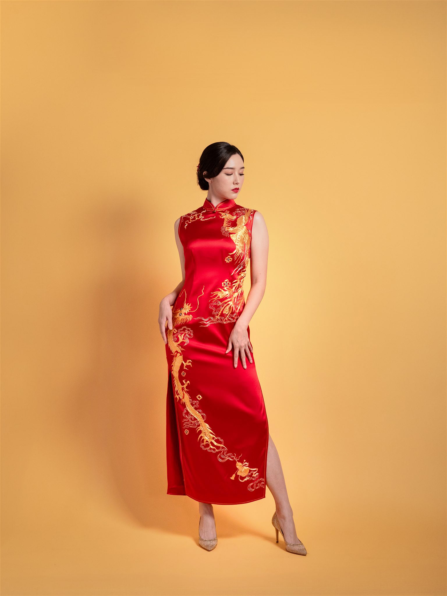 Front view of Red Silk Goldwork II Chinese wedding dress with flying dragon and phoenix embroidery.