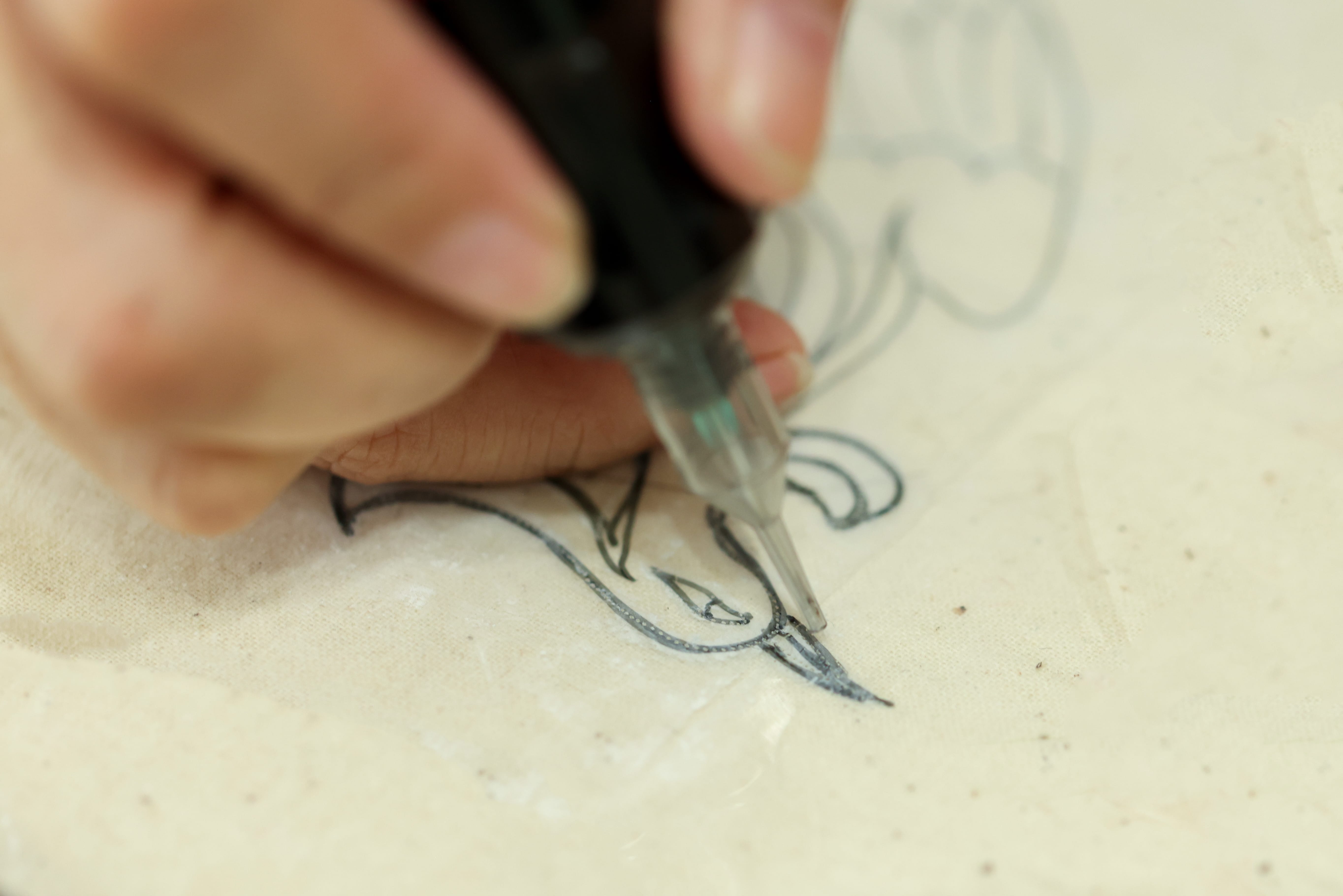 Custom Qipao embroidery sketch by artisan at JINZA