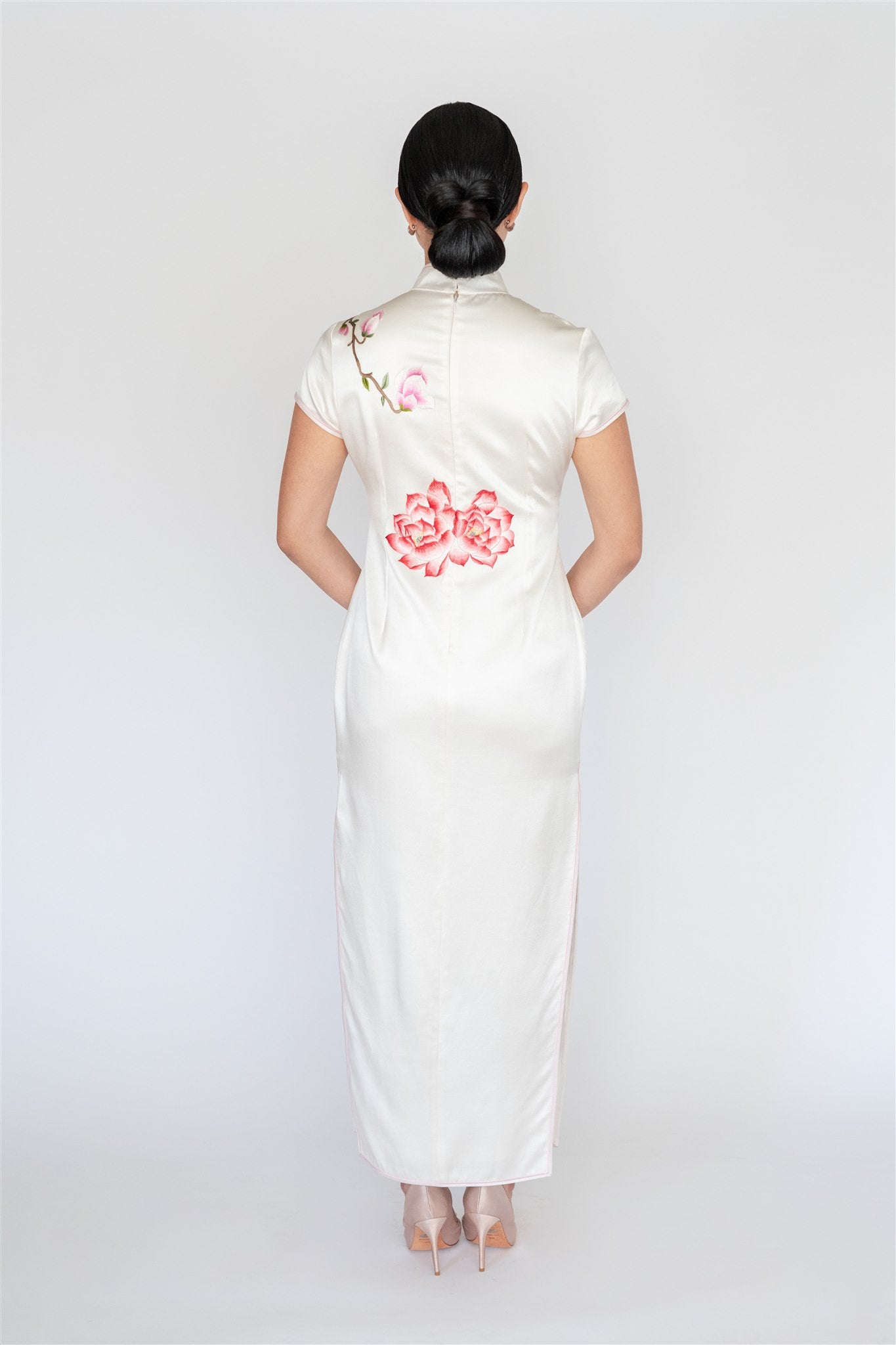 view of white cheongsam dress with flotus embroidery