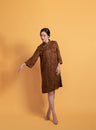 Brown Xiang Yun silk Qipao dress with an A-line silhouette, 3/4 sleeves, and over-the-knee length, a traditional Chinese dress with a flattering sihouette.