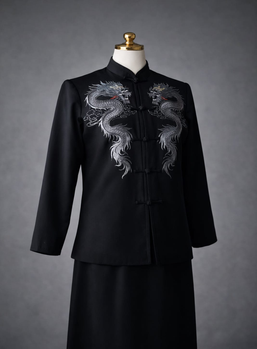 Bespoke black silk Tang suit with silver double dragon hand embroidery and frog buttons, custom made to measure at JINZA Los Angeles
