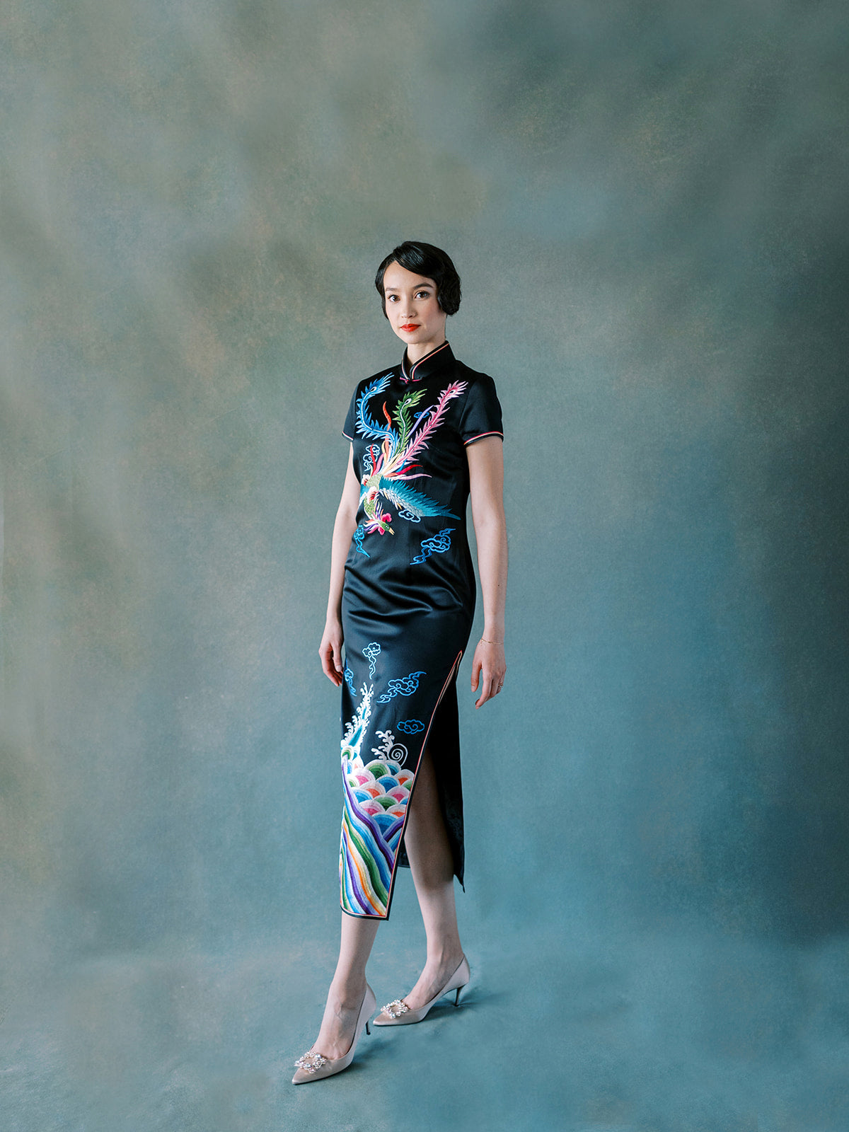 Black silk Qipao with rainbow phoenix and sea wave embroidery