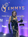 A real client wearing our black silk Qipao with dragon and phoenix to Emmys.