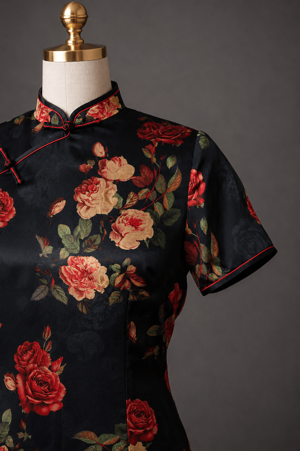 Upper body detail of black mulberry silk rose print Qipao with red piping mandarin collar and Pankou closure — Shanghai 1920s Cheongsam by JINZA Oriental Couture, Los Angeles