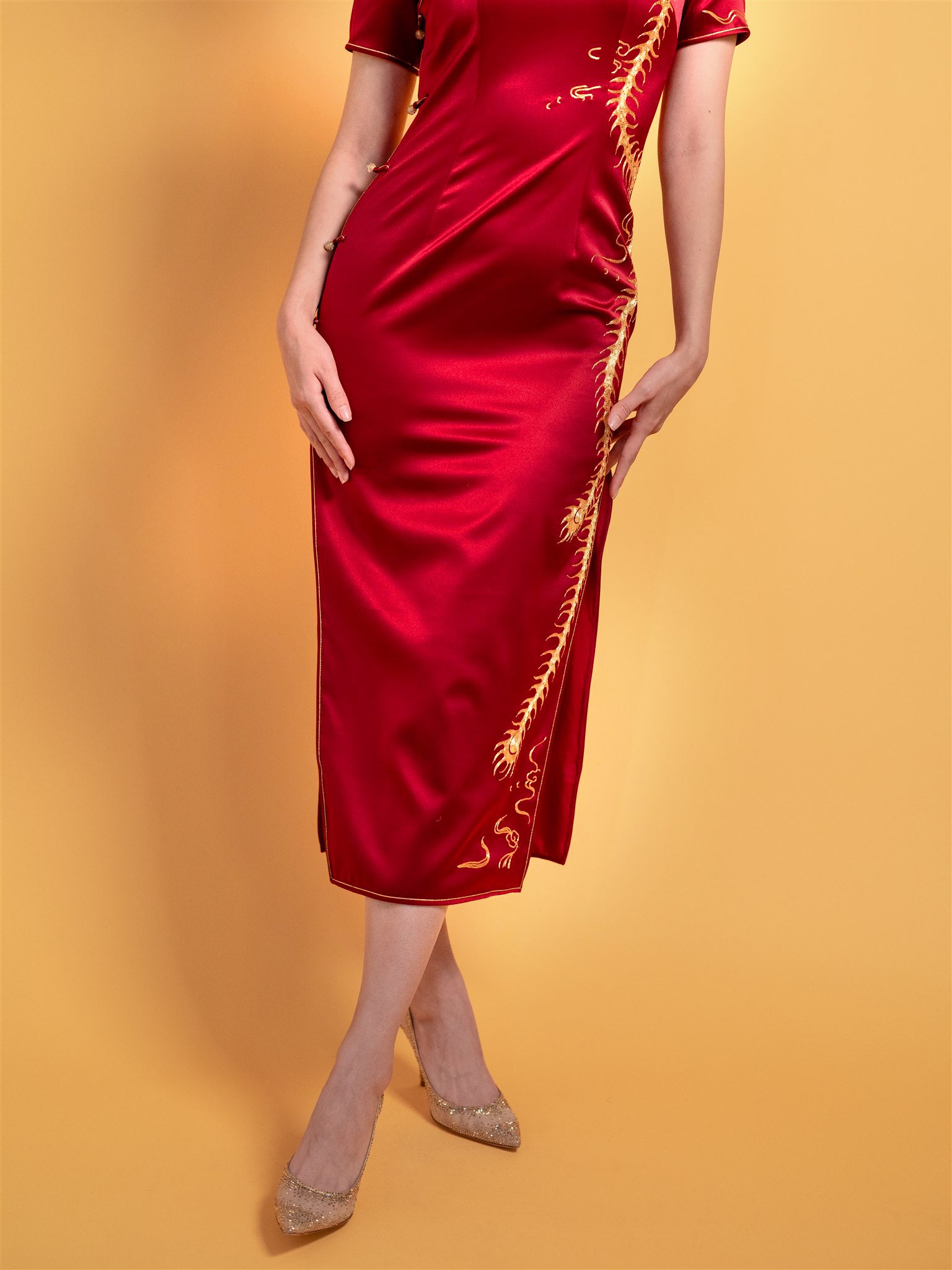 Side view of red Qipao dress with flying phoenix for tea ceremony wedding