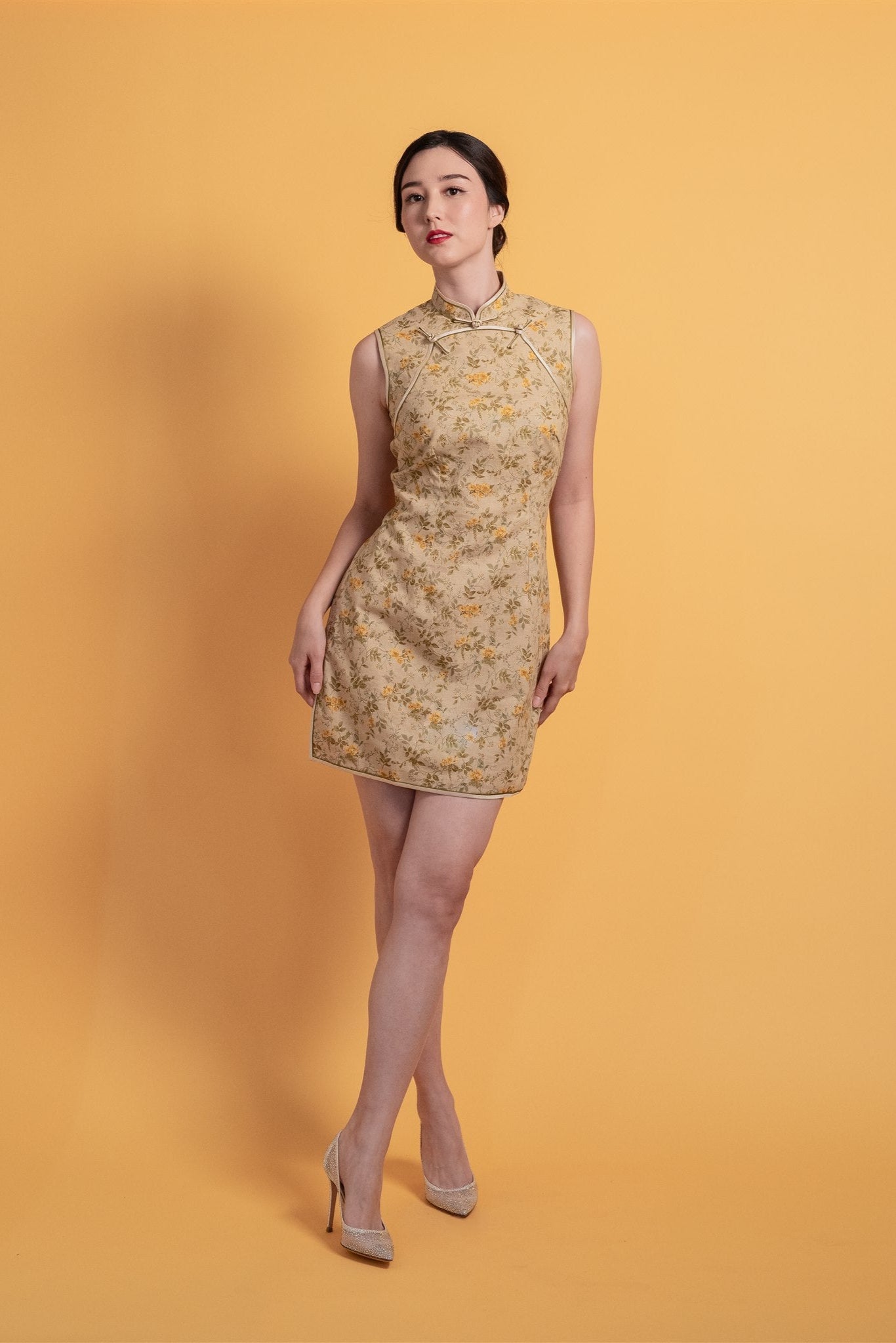 Gold Japanese cotton Cheongsam with short sleeves and A-line silhouette, front view.