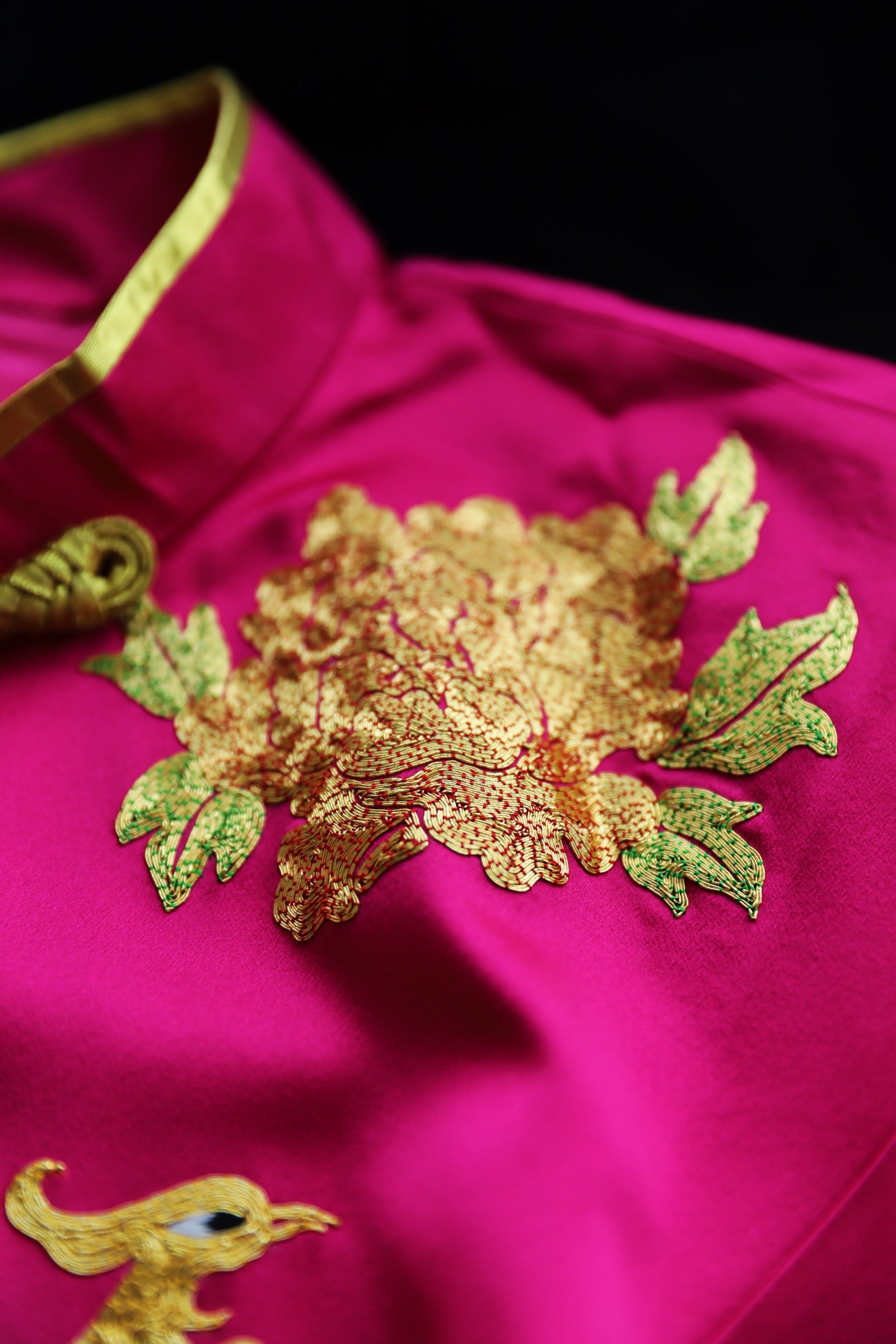 Gold peony embroidered on red Qipao