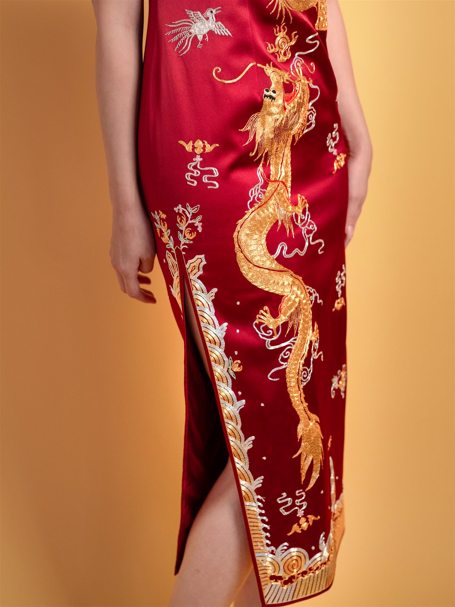 Detail of gold and silver dragon embroidery on Qipao
