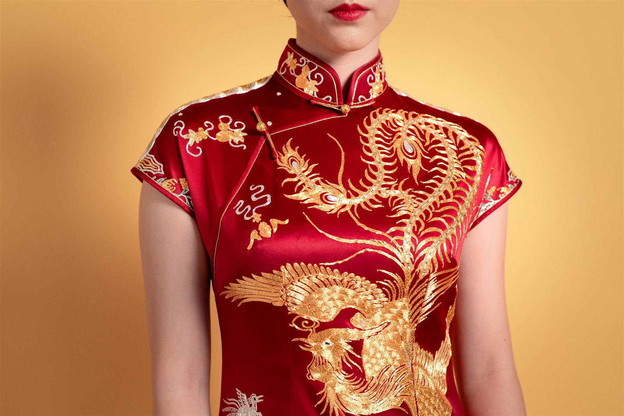Detail of gold and silver phoenix embroidery on Qipao
