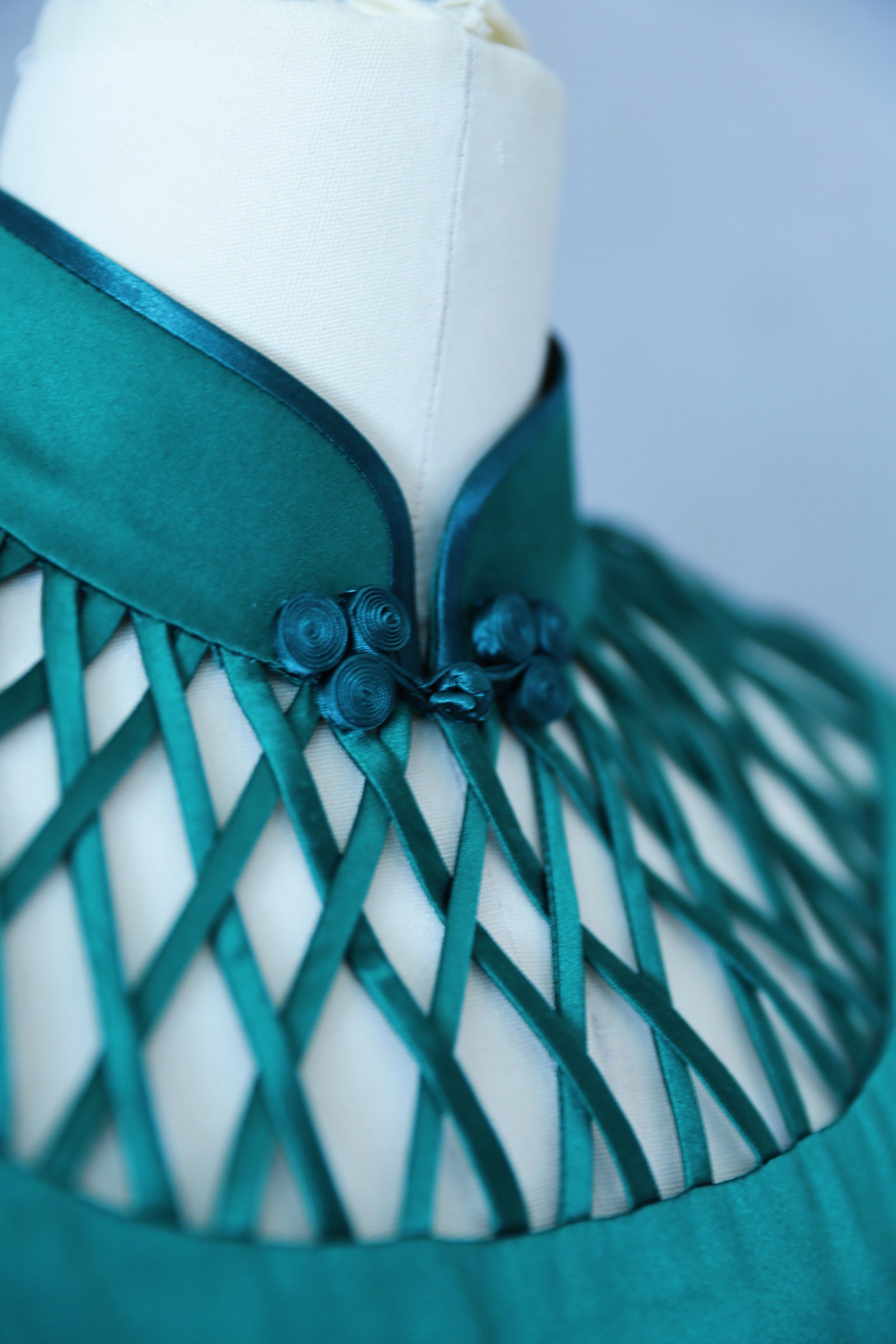 Emerald Green Silk Qipao with Hand-Finished Lattice Details