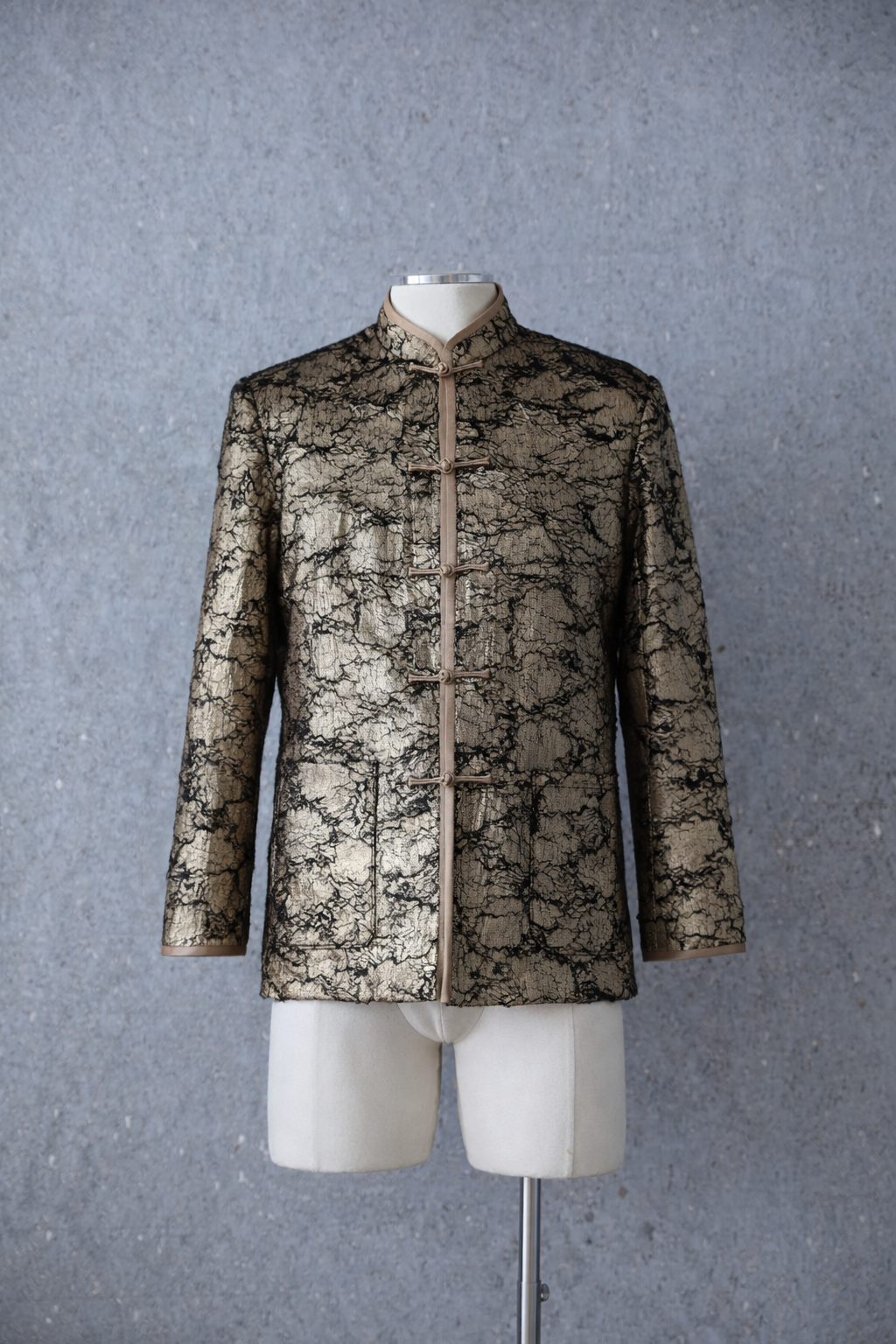 Italian leaf-texture gold silk Tang suit jacket with traditional frog closures.