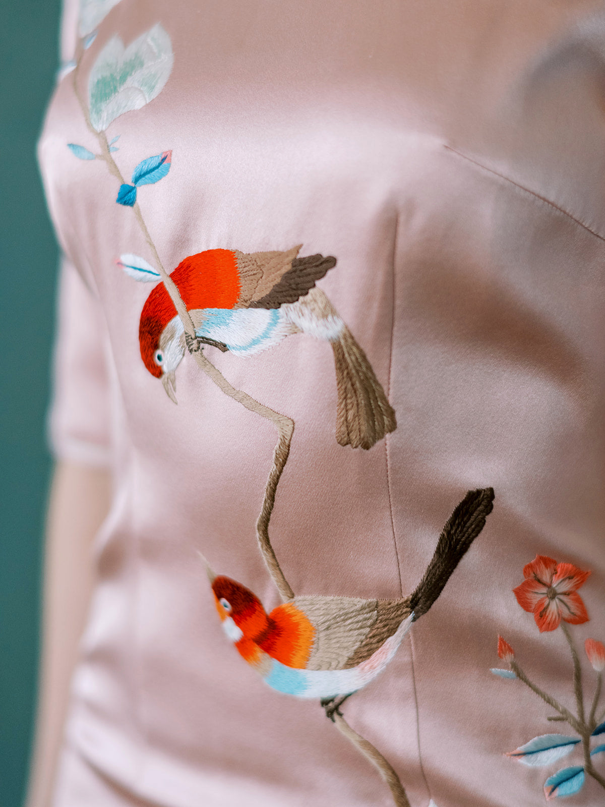 Hand-embroidered magnolia and birds on silk Qipao dress, traditional Shanghai motif