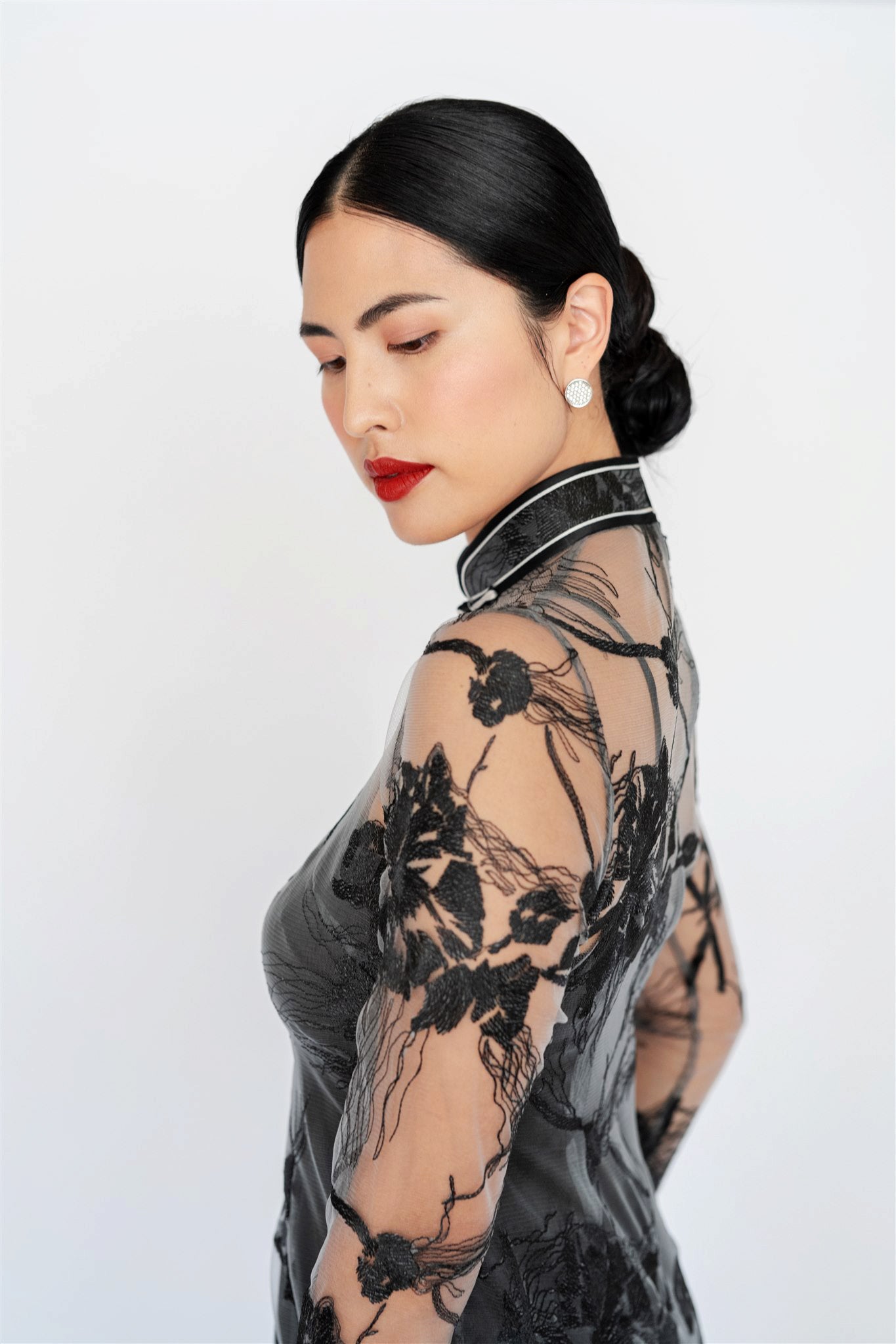 Long lace sleeve detail on black cheongsam dress