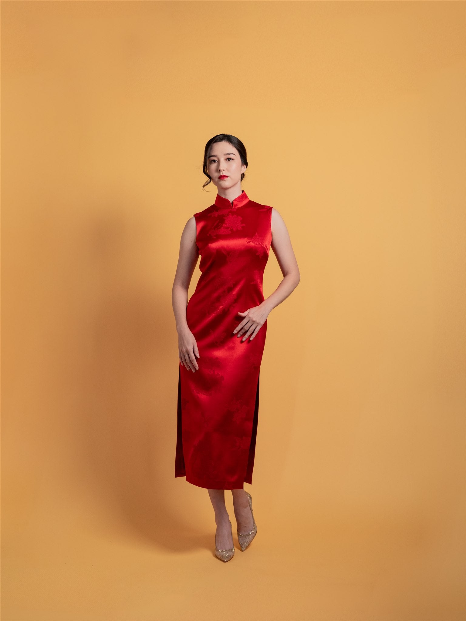 Front view of 2-Piece modern Cheongsam dress, it is a refined red qipao with modest arm coverage for formal occasions.