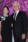 A couple wearing black silk mermaid Qipao dress at White House private dinner