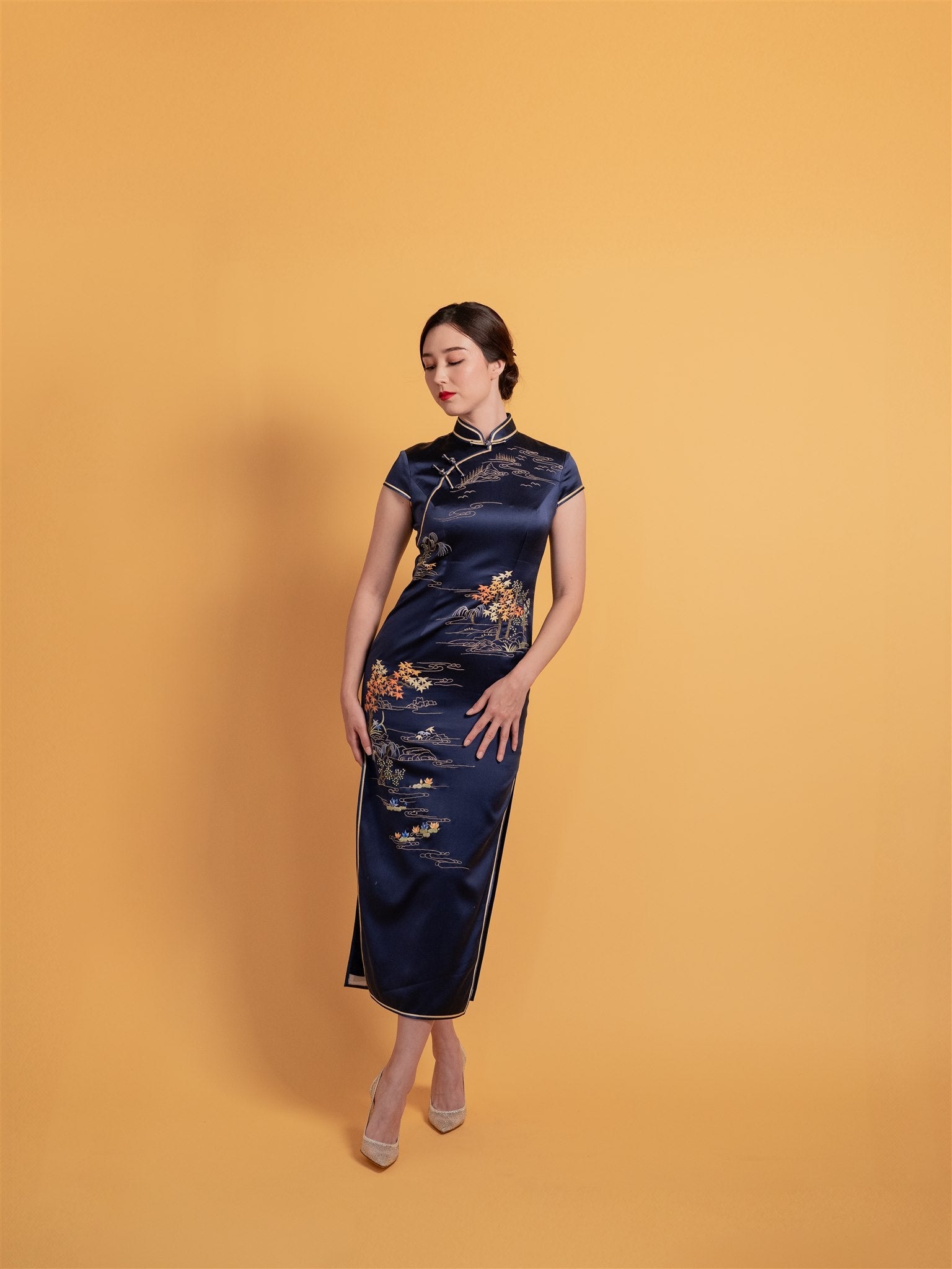 Navy blue silk Cheongsam dress with Shu embroidery inspired by “Poet on a Mountain Top,” designed by JINZA