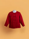 Front image of an oversized wool red tang suit jacket, loose fitted with long sleeves and Pankou Knot buttons, around neckline. 