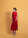 Front view of a red lace Chinese Wedding Dress, sleeveless, featuring a mandarin collar for a minimalist style, perfect for modern tea ceremony weddings.