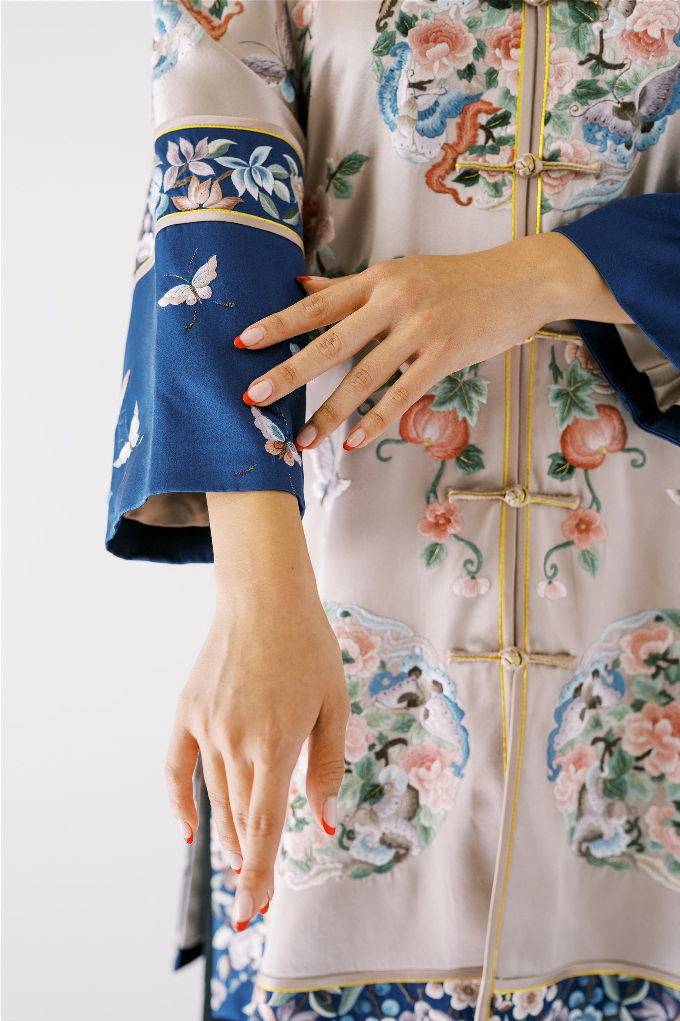 Sleeves with blue silk and embroidered florals, butterflies and leaf details - Silver Blue Tang Jacket with Elegant Fit.