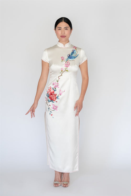 White silk cheongsam with magnolia and pomegranate embroidery, front view