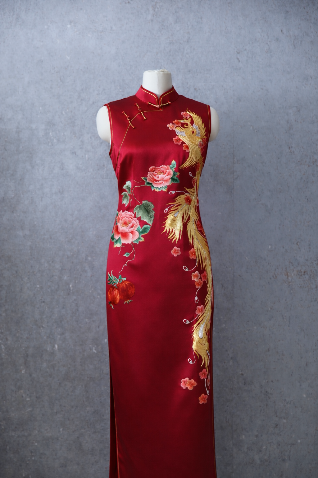 Wine red silk Qipao with peony, pomegranate, and phoenix embroidery, front view.