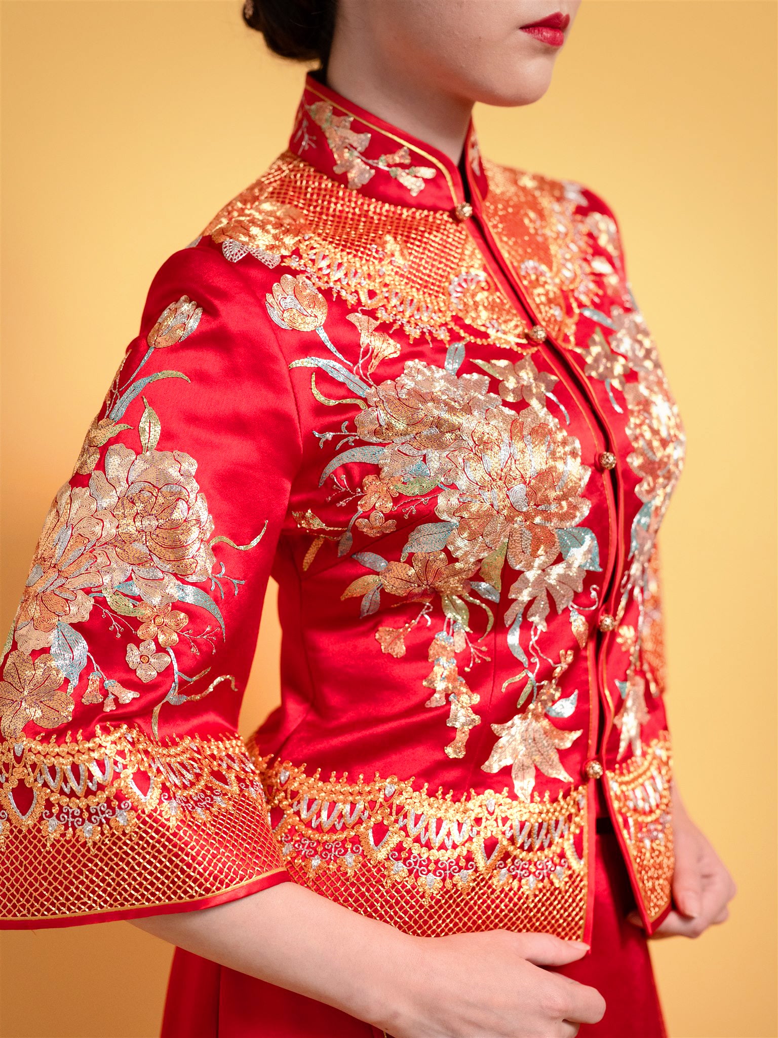 Custom embroidery detail on Peony Xiu He Fu – phoenix and floral motifs
