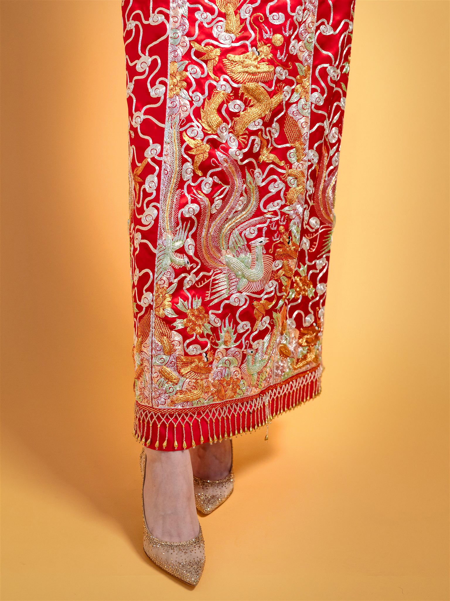 pomegranate and lucky cloud details on the skirt