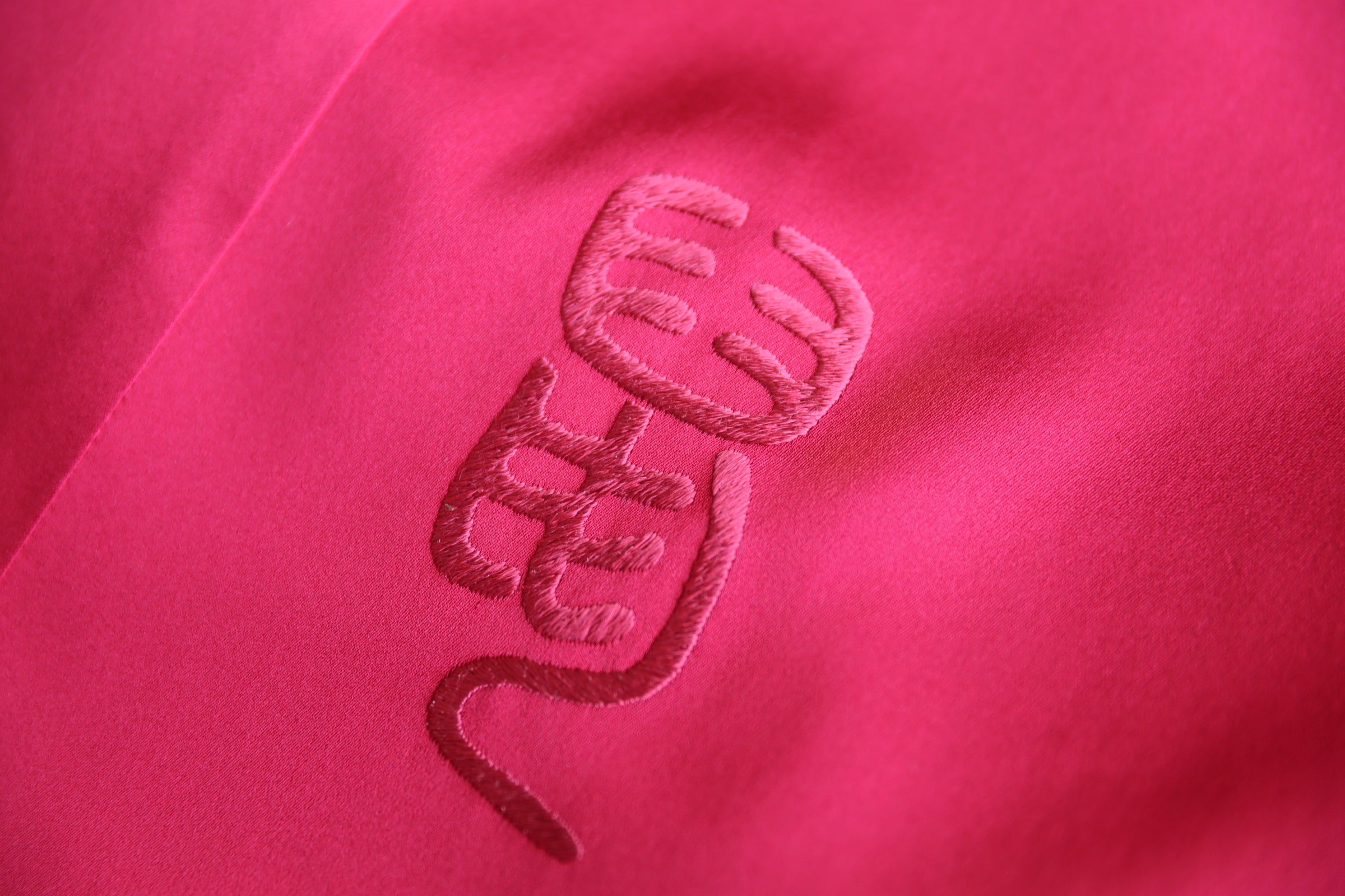 Zodiac sign rat embroidery on a red Qipao